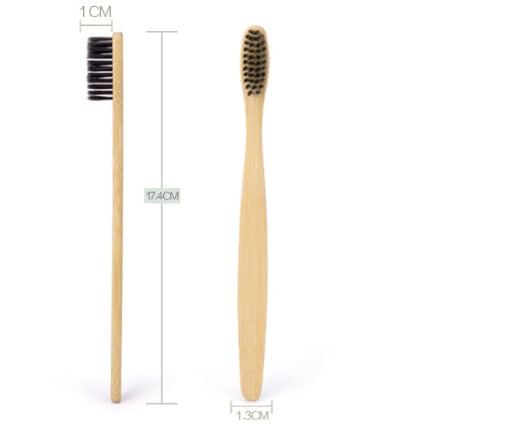 Charcoal bamboo toothbrush with bamboo handle and charcoal bristles for a deep, natural clean